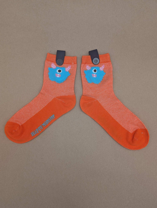 Happy Monster Orange Kids Socks – Magnetic Lock and Loop Design - Le Loxx